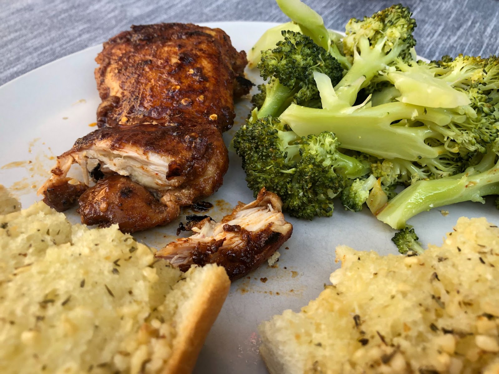 Homemade Grilled Chicken Thighs and Garlic Bread with Steamed Broccoli